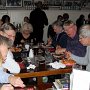 Dinner at the 'Red Hot'. Barrie Ward on right with blue pullover.